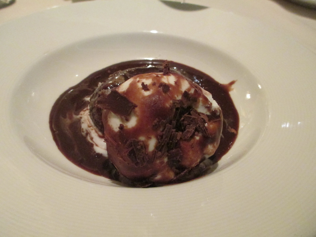Special chocolate cake with ice cream and chocolate sauce