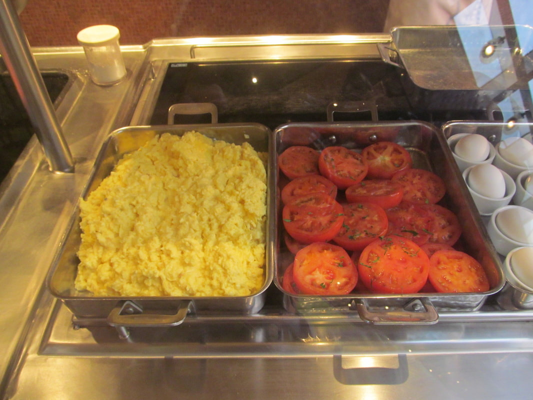 Carnival Cruise Lido Breakfast Buffet Scrambled Eggs and Grilled Tomatoes