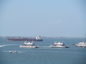 2 Ferries Moving Across Water