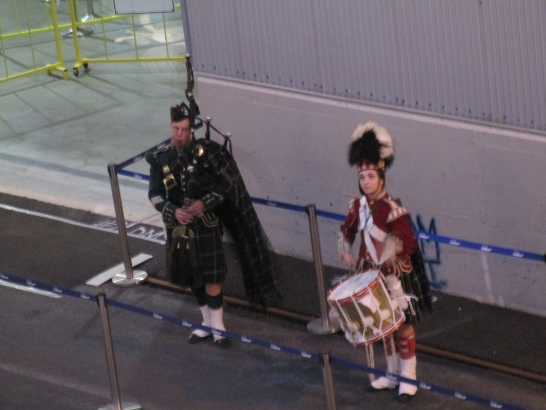 Drum and bagpipe were played as we docked