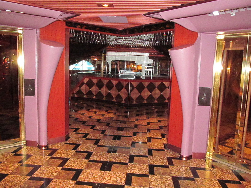 Empress Deck Atrium Glass Elevator Entrances