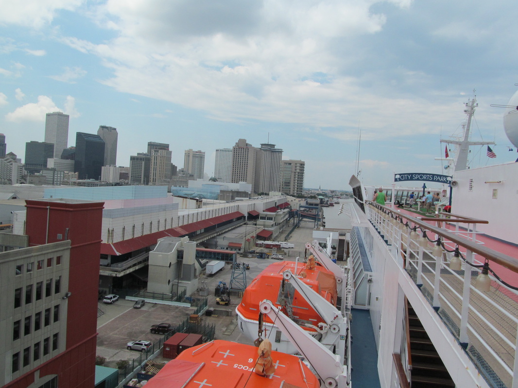 Carnival Elation Sideview and New Orleans Skyline