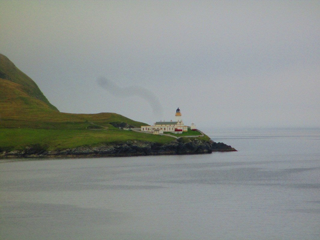 Lighthouse seen as we were sailing from Shetland Islands
