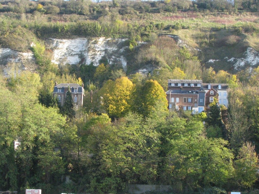 Cliffs and homes along the Seine River