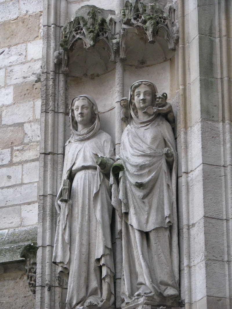 Two of many statues in Cathedrale Notre-Dame de Rouen