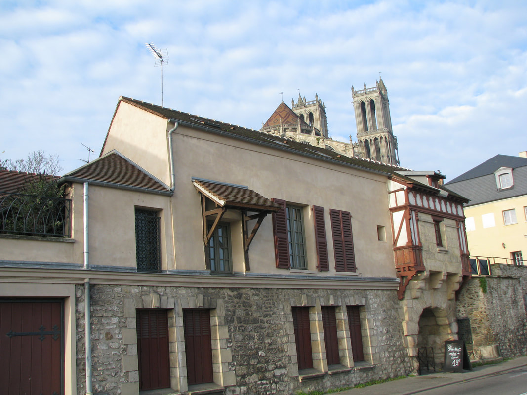 First view of Collegiate Church of our Lady of Mantes- dominates the sky of Mantes from all directions 